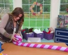 DIY Giant Lollipop Holiday Decoration from Pool Noodles